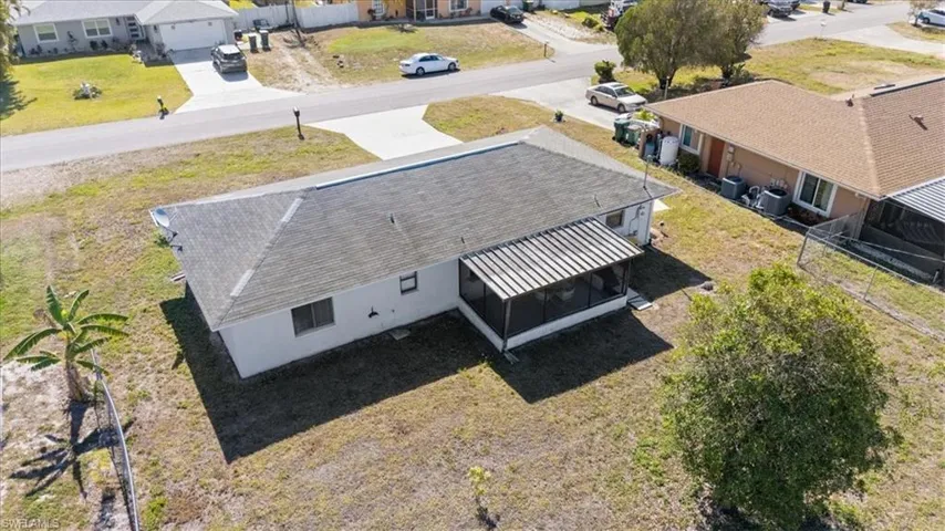 Birds eye view of property with a residential view