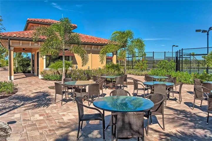 View of patio with outdoor dining area