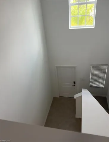 Upstairs view to the first floor, front door