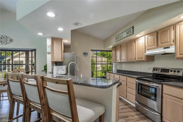 Open Kitchen concept with living area and breakfast bar.