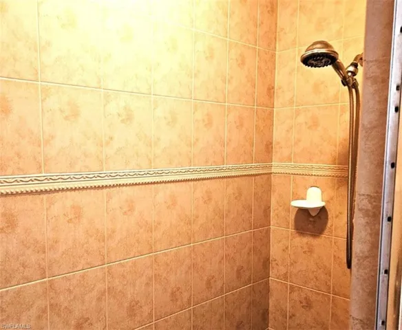 Bathroom view of tiled shower