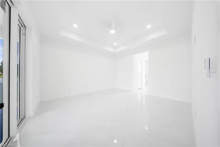 View of patio featuring a ceiling fan