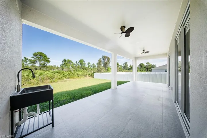 View of patio with ceiling fan