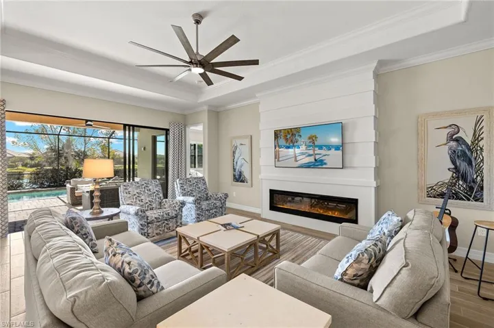 Great Room with Electric Fireplace and Custom Paneling