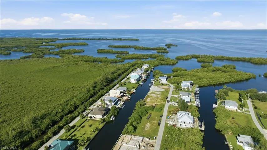 Waterfront community featuring canal access, private boat docks, and direct access to open water