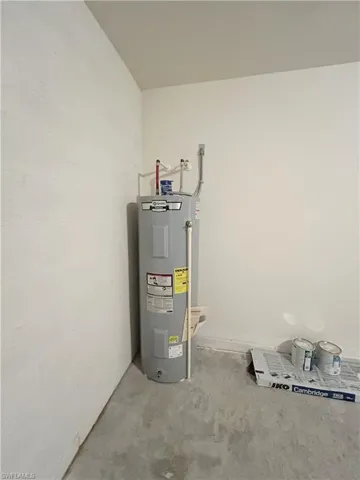 Utility room with electric water heater