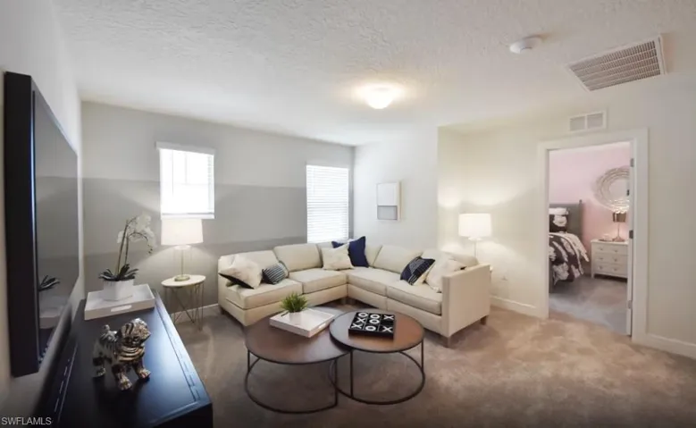 Photos are from a furnished model from another community. Options for this home may vary.