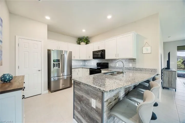 Foyer featuring light tile patterned floors