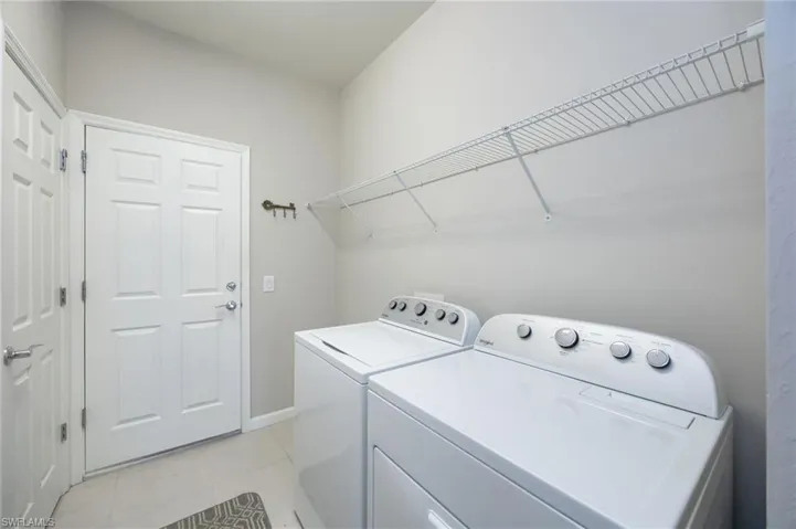 Bedroom with light wood finished floors and ceiling fan