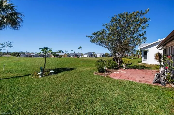 View of yard with a patio area
