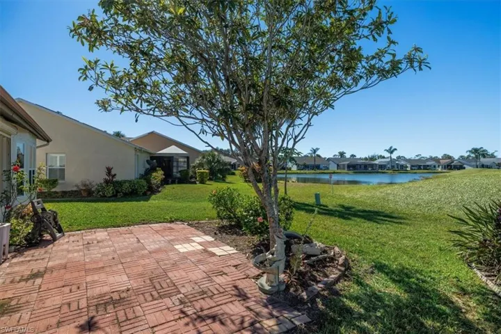 View of patio / terrace featuring a water view