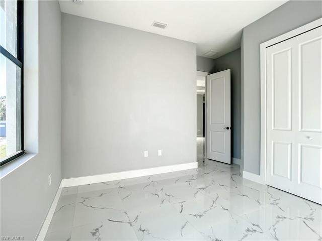 2906 3rd ST SW, LEHIGH ACRES FL 33976