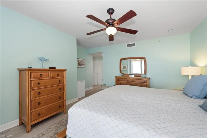 Bedroom with a closet and ceiling fan