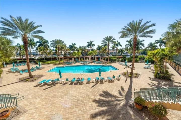 Community pool with a patio area