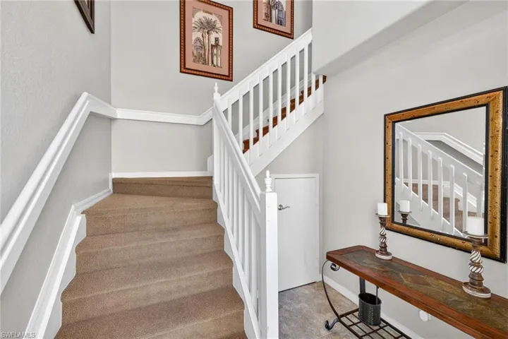 Stairs featuring baseboards