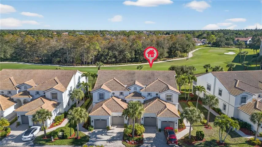 Aerial view of residential area with a golf course