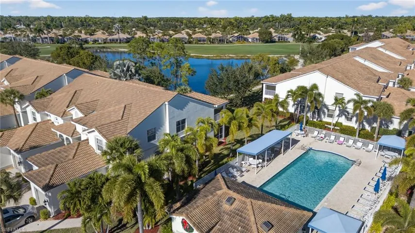 Aerial view of residential area with a large body of water