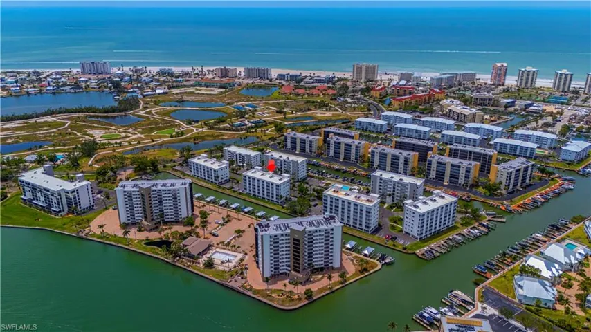 Drone / aerial view with a water view and a view of city