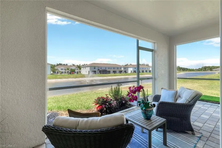 Screened back lanai with lake views.
