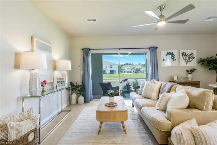 Spacious living room with wide lake view.