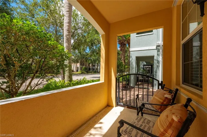 15594 Latitude Dr Bonita Springs FL 34135-Front porch off downstairs bedroom