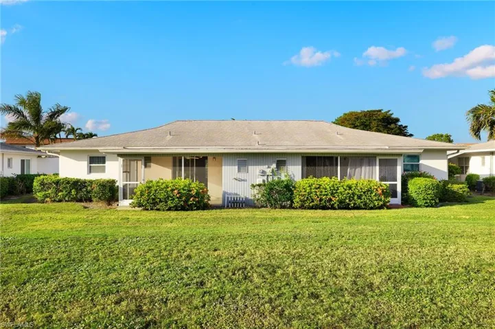 Rear Elevation showing Lanai (property to the left in this photo)