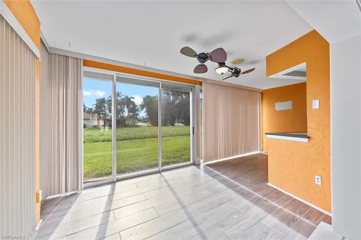 View of the bonus room and the backyard.