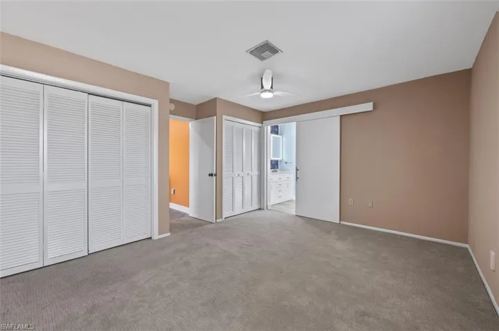 Primary bedroom has two closets and is located off the great room