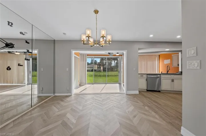 Dining space leads into kitchen and bonus area