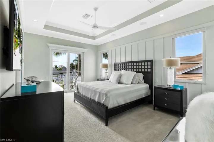 Bedroom with light colored carpet, access to outside, a ceiling fan, and recessed lighting