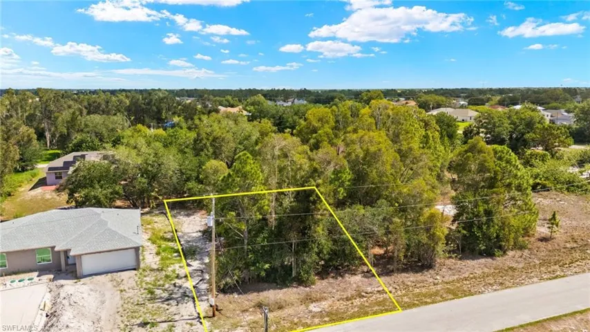 Aerial overview of property's location featuring property boundaries highlighted