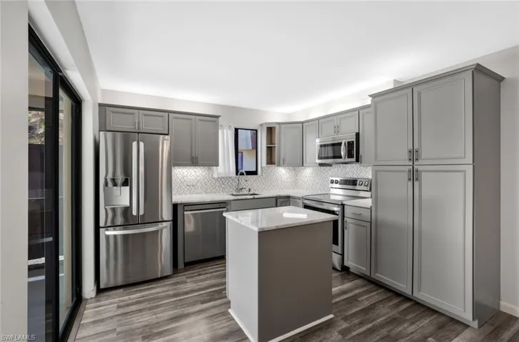 Totally renovated kitchen with custom cabinetry and center island