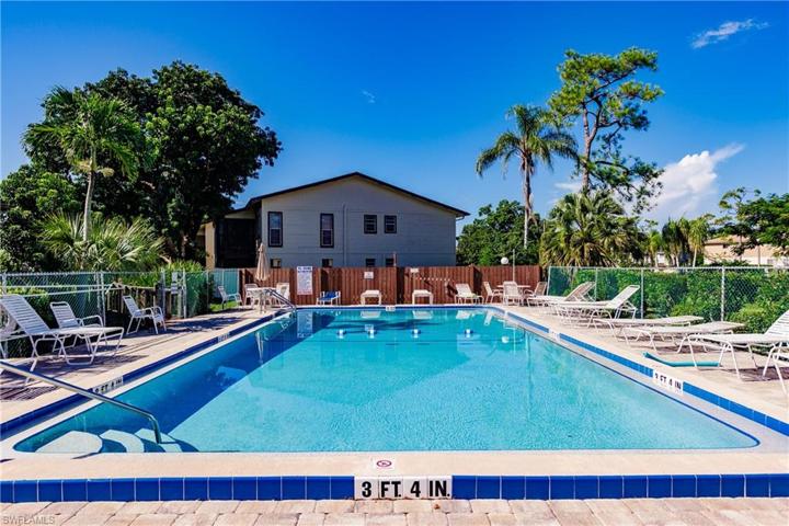 Pool with lounge chairs.