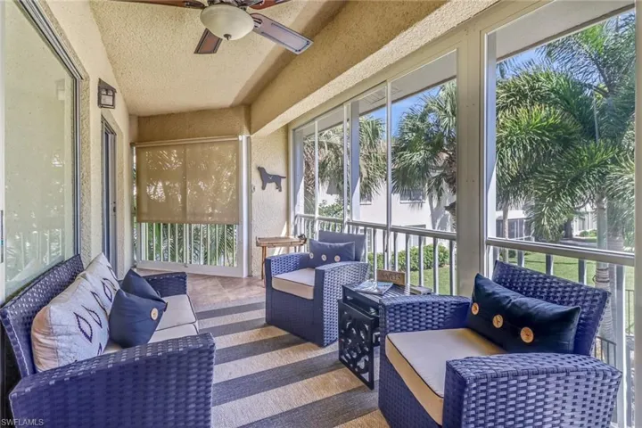 Sunroom with an outdoor hangout area and ceiling fan