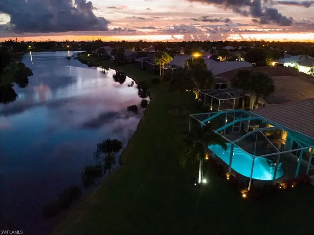 Aerial view at dusk with a water view