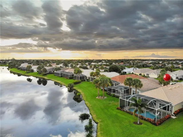 Aerial view at dusk with a water view