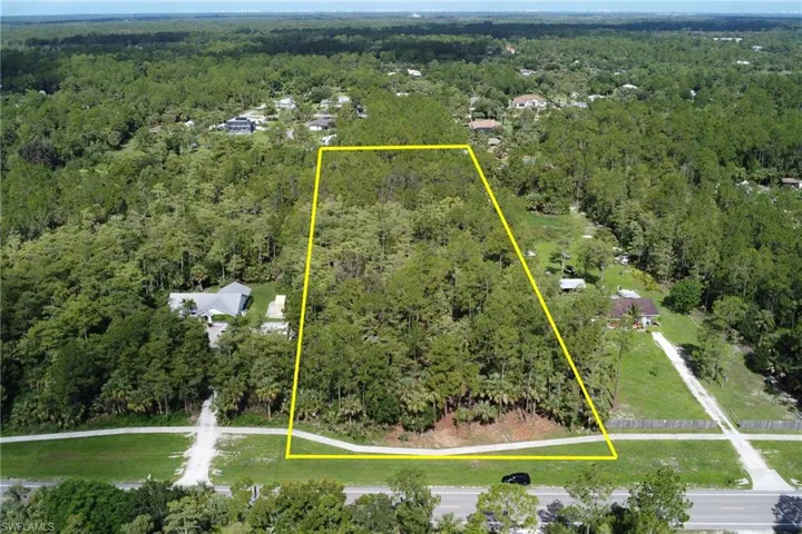 Aerial view of property's location with a forest and property boundaries highlighted