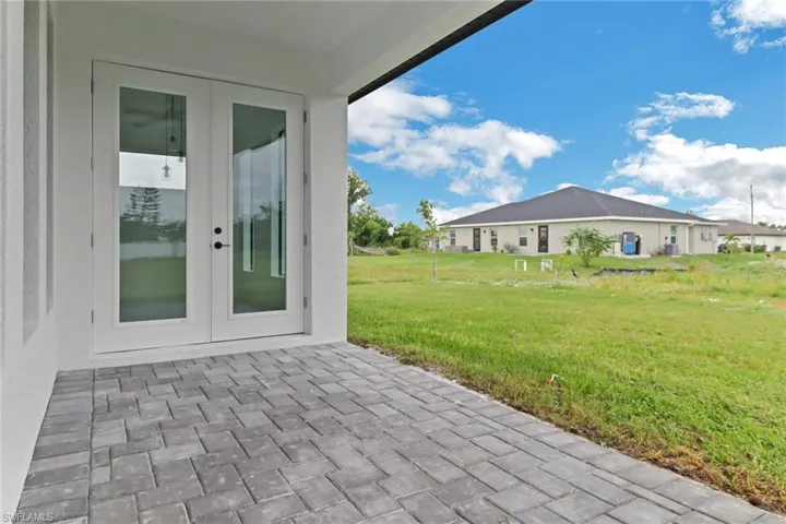 View of patio featuring french doors