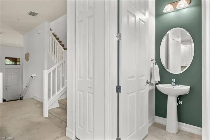 Bathroom with tile patterned floors