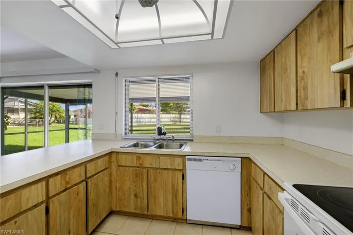KITCHEN WITH VIEW TO BACKYARD