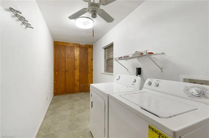 INSIDE LAUNDRY ROOM WITH BUILT-IN STORAGE