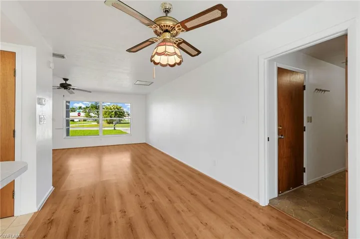 FACING LIVING ROOM FROM DINING AREA