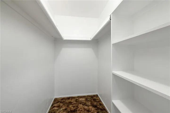PRIMARY BEDROOM WALK-IN CLOSET