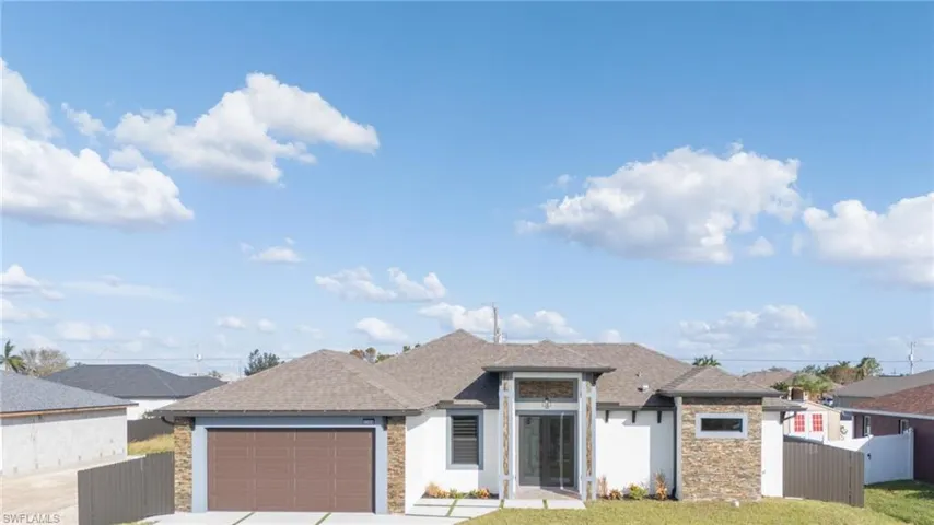View of front of home with a garage