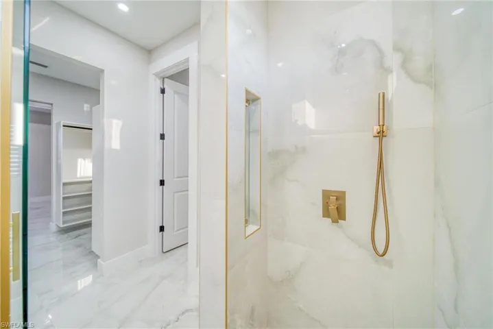 Bathroom with a tile shower