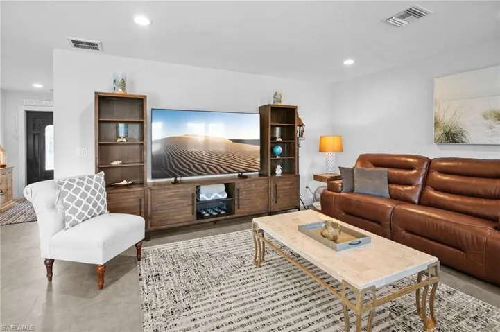 Living area featuring recessed lighting