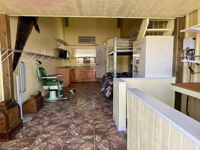 View of patio / terrace featuring tankless water heater