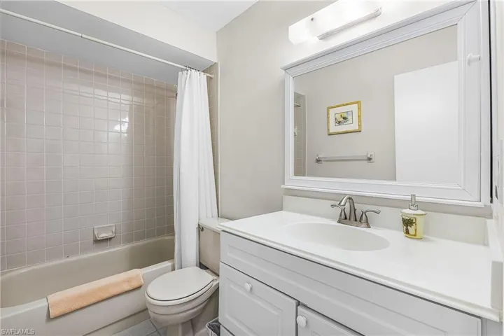 Full bath with shower / bath combo and vanity