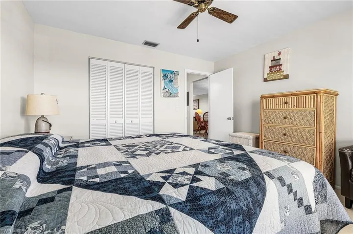Bedroom featuring a closet and a ceiling fan