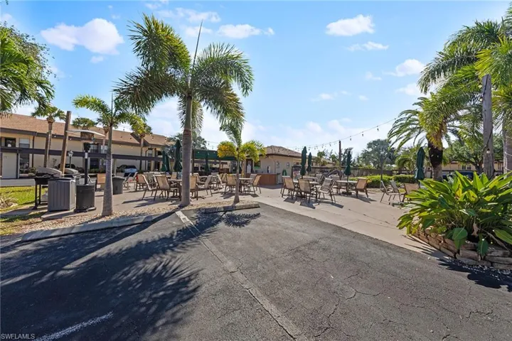 Surrounding community featuring outdoor dining area and a patio area